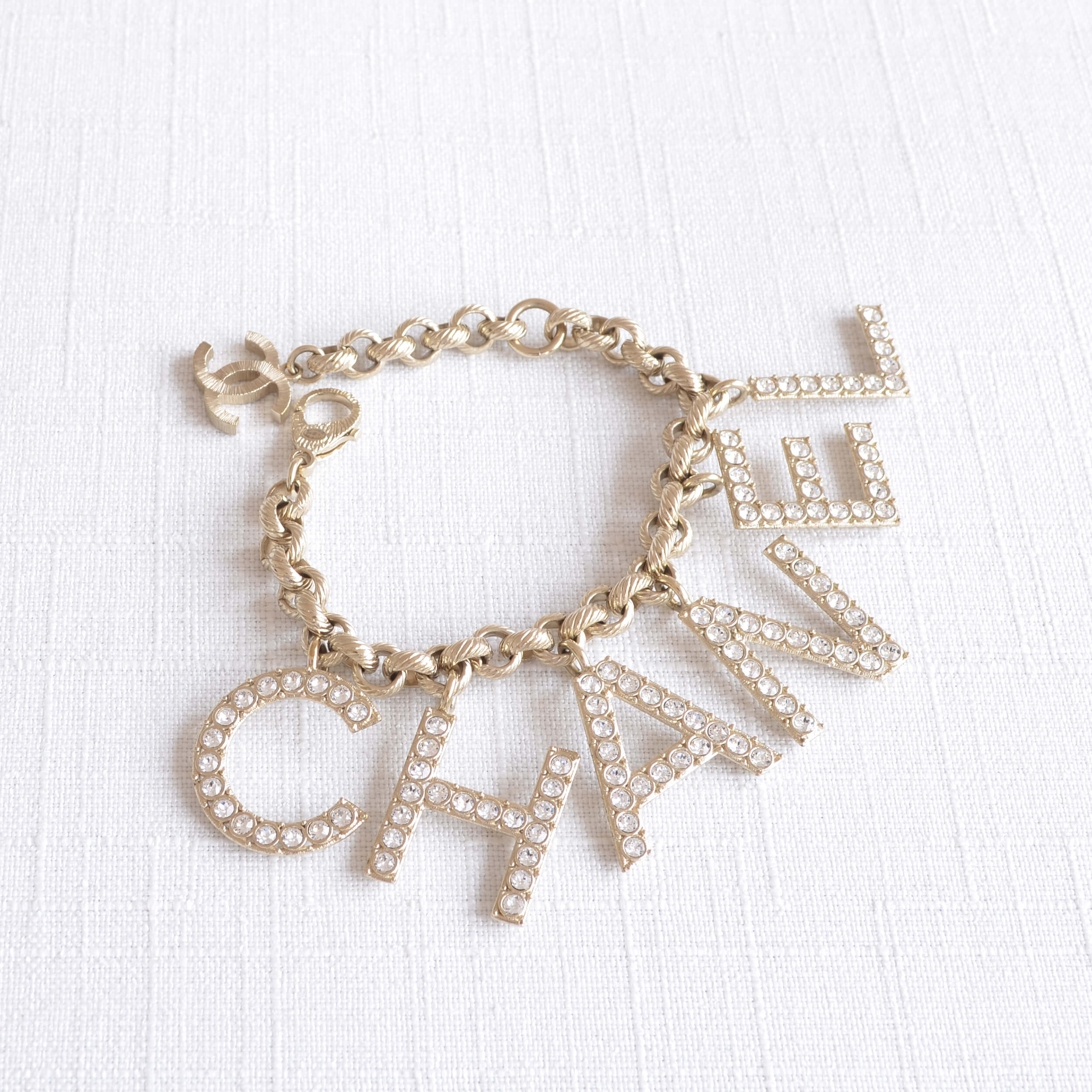 CHANEL 19S Letter Bracelet Logo Armband Strass Hellgold Pre-Loved 225112 2